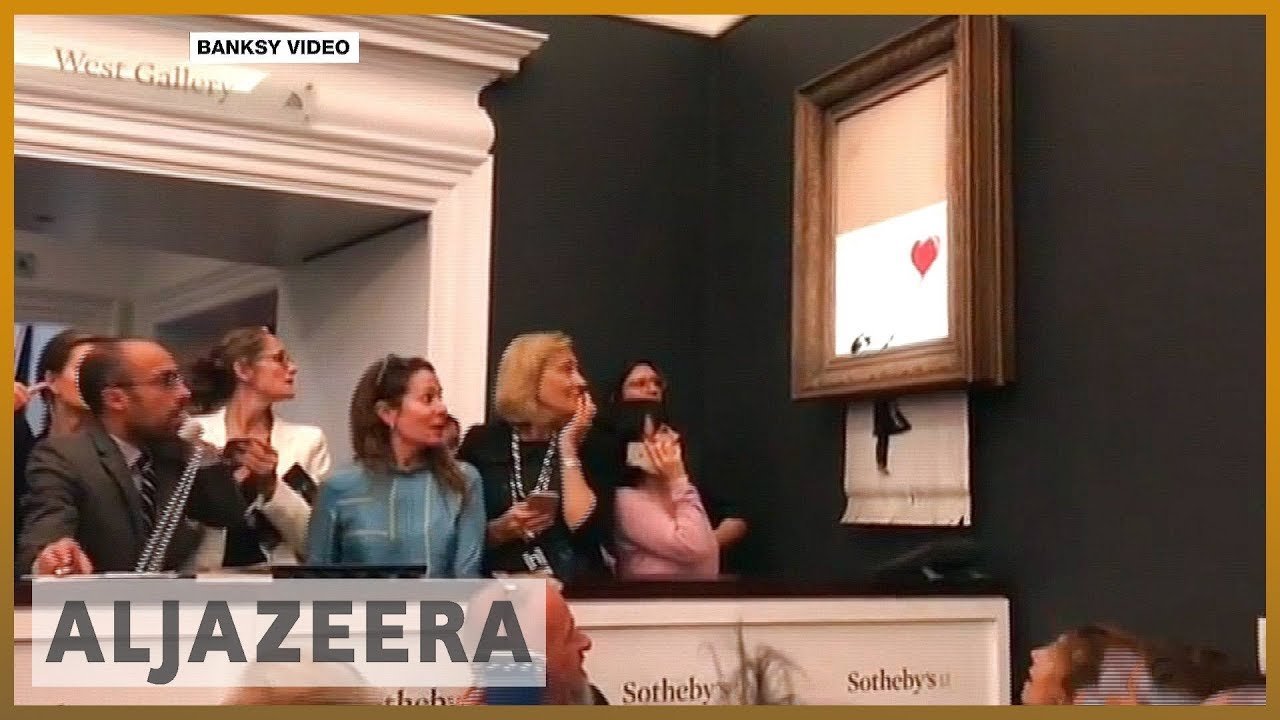 🇬🇧 Banksy painting self-destructs after $1.4 million sale | Al Jazeera English